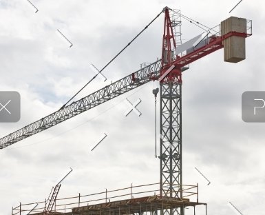 demo-attachment-196-building-in-progress-and-crane-machinery-K-1